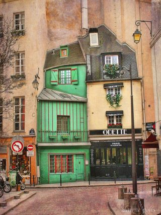 Dos casas estrechas, una de ellas una cafetería llamada Odette, construida en un acantilado como una pared en la zona de la Sorbona de París
