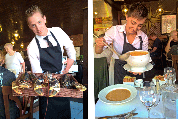 Servers present fresh fish dishes at the Perard restaurant, Le Touquet, Pas de Calais, France