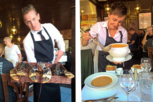 Los servidores presentan platos de pescado fresco en el restaurante Perard, Le Touquet, Pas de Calais, Francia