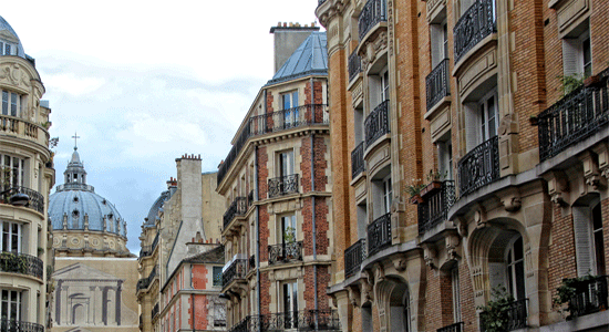 View of the perfect holiday apartment in Paris, with a balcony in a stunning building